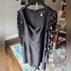 Hutch black mini dress sheer polka dot sleeves.Size 10 some small snags in front